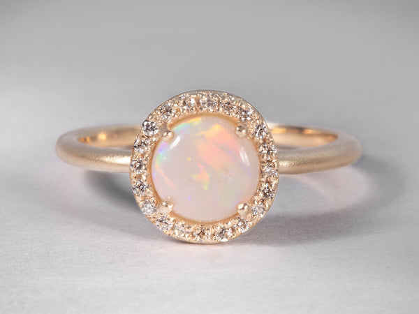 Front view of opal and diamond ring