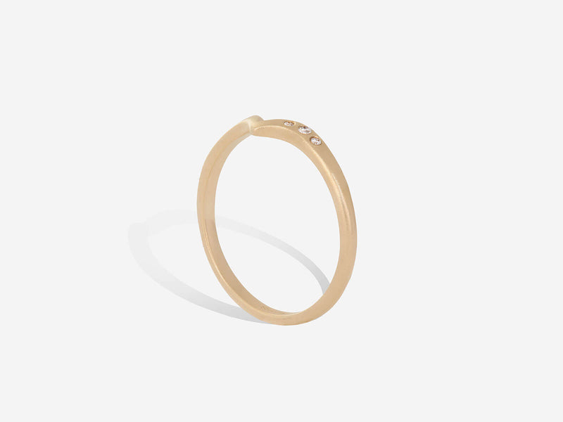 3/4 standing profile view of ring