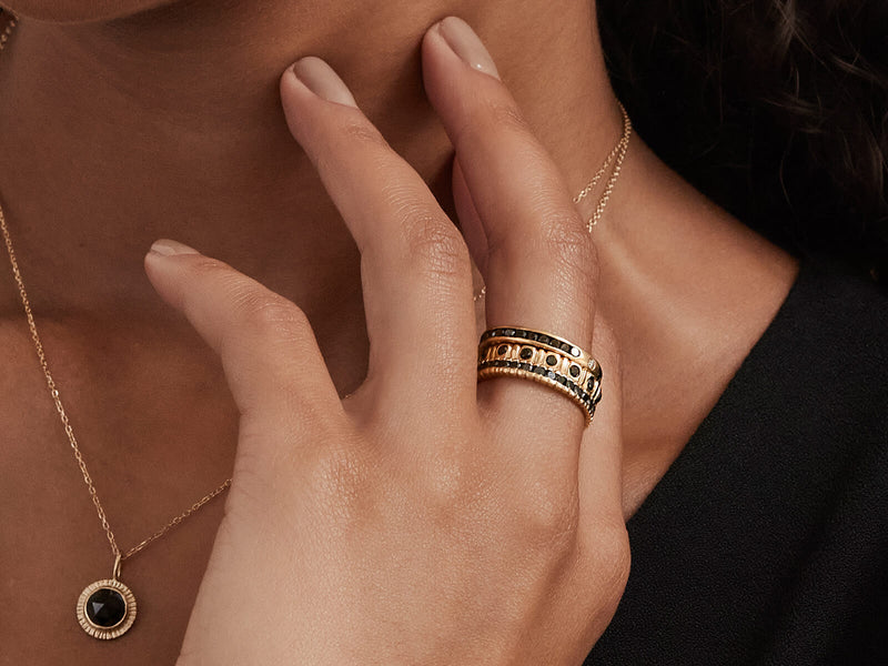 Model wearing Large Soleil Ring in a stack