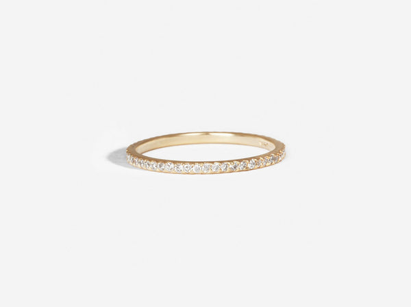 Handset pave eternity band with diamonds in 14k yellow gold
