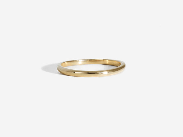 Simple, half-round gold band with high polish finish