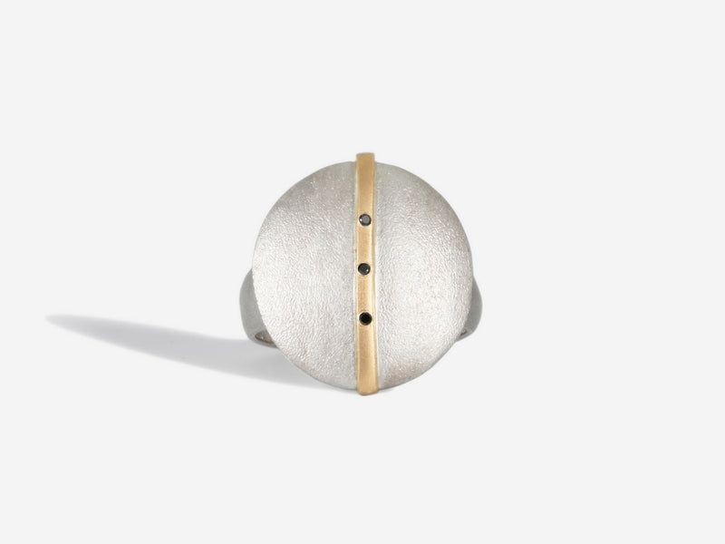 Front view of ring with black diamonds