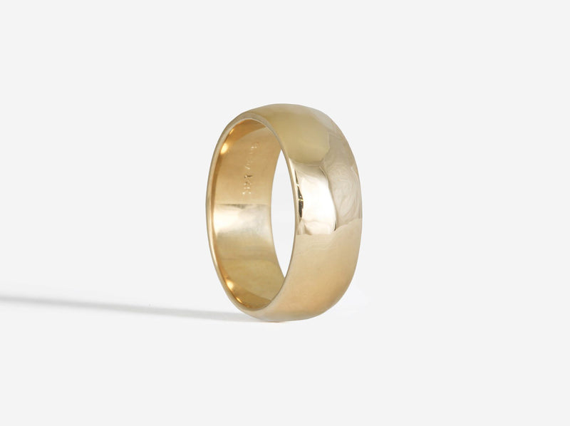 Three-quarters silhouette view with high polish finish in 14k yellow gold