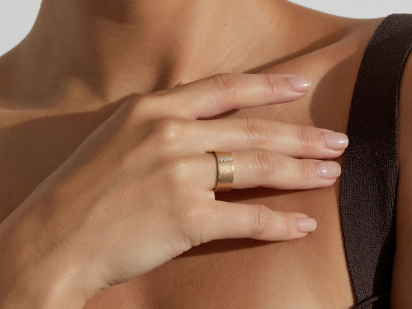 close up of model wearing ring 