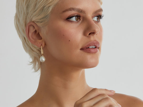 model wearing earrings