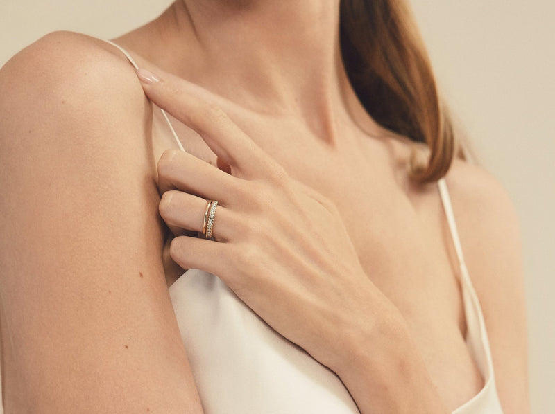 Model wearing ring with a plain 1.9 mm gold band