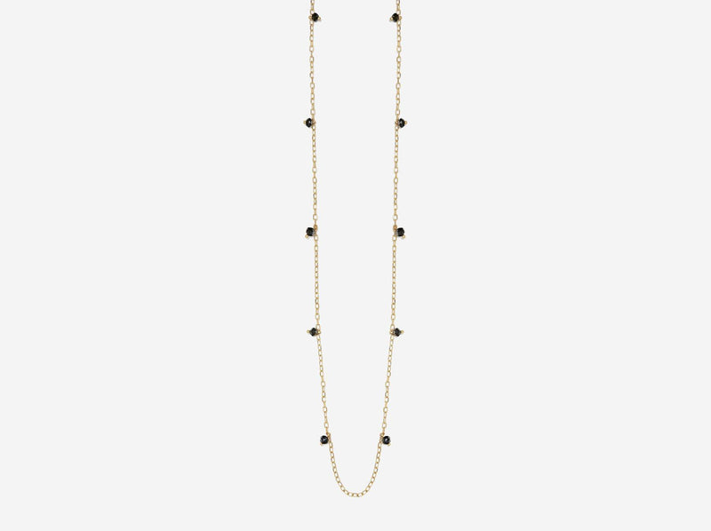 Delicate gold chain with black diamond rondelles attached every inch or so