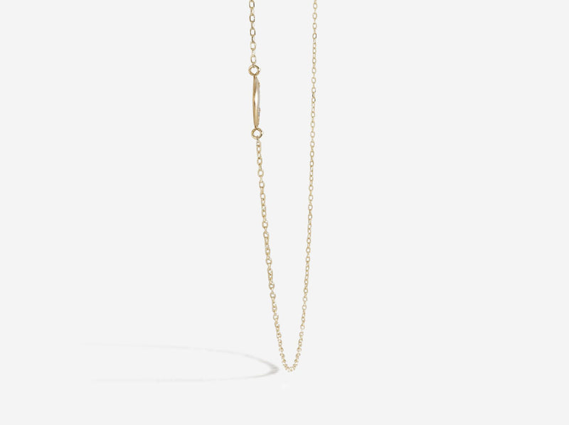 Profile view of diamond slice on chain