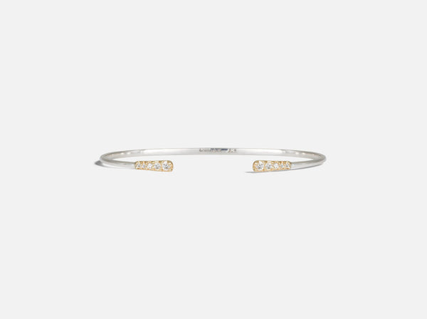 Front view of the mixed metal cuff with diamonds