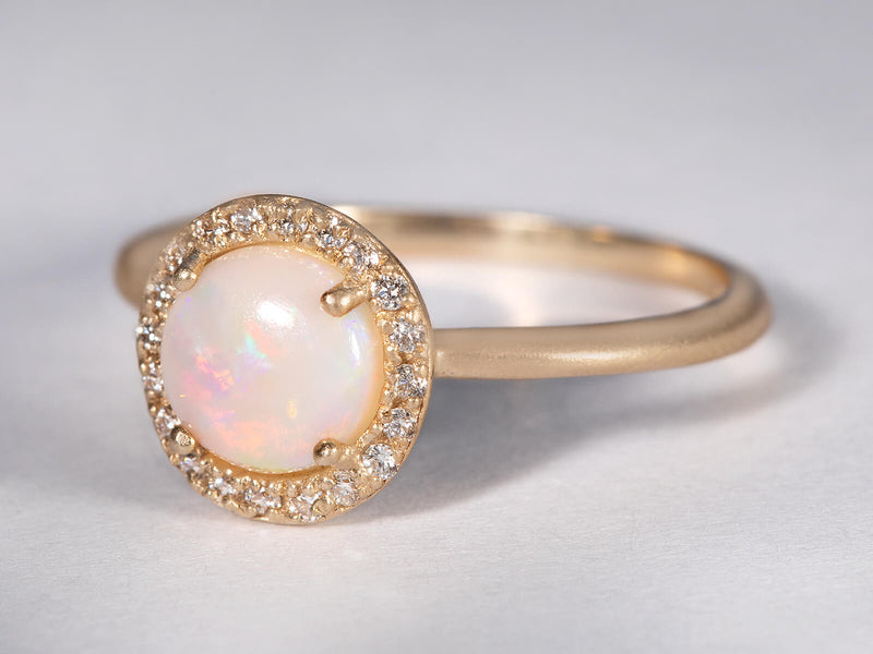 3/4 view of opal and diamond ring