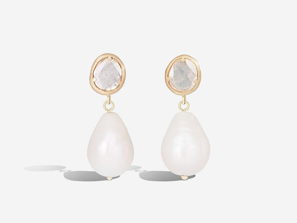 Front hanging view of diamond slice pearl drop earrings