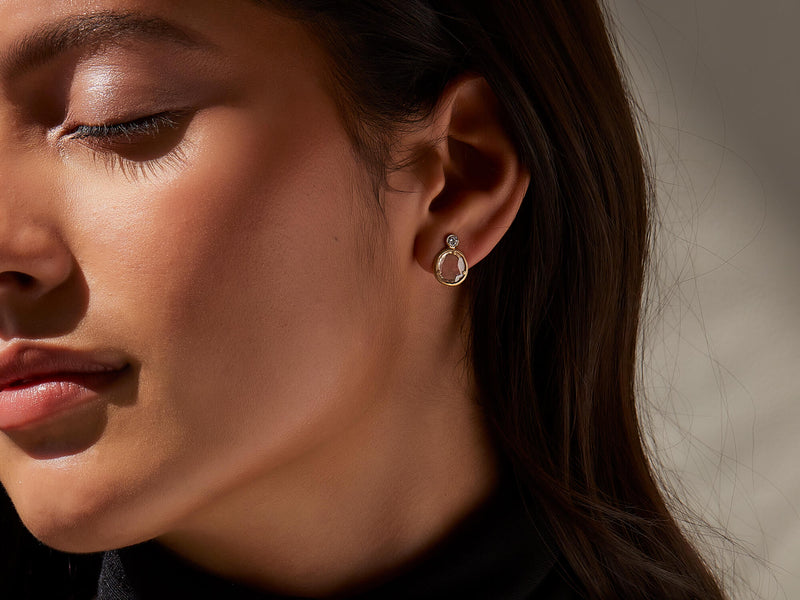 Close up of model wearing diamond slice bling stud